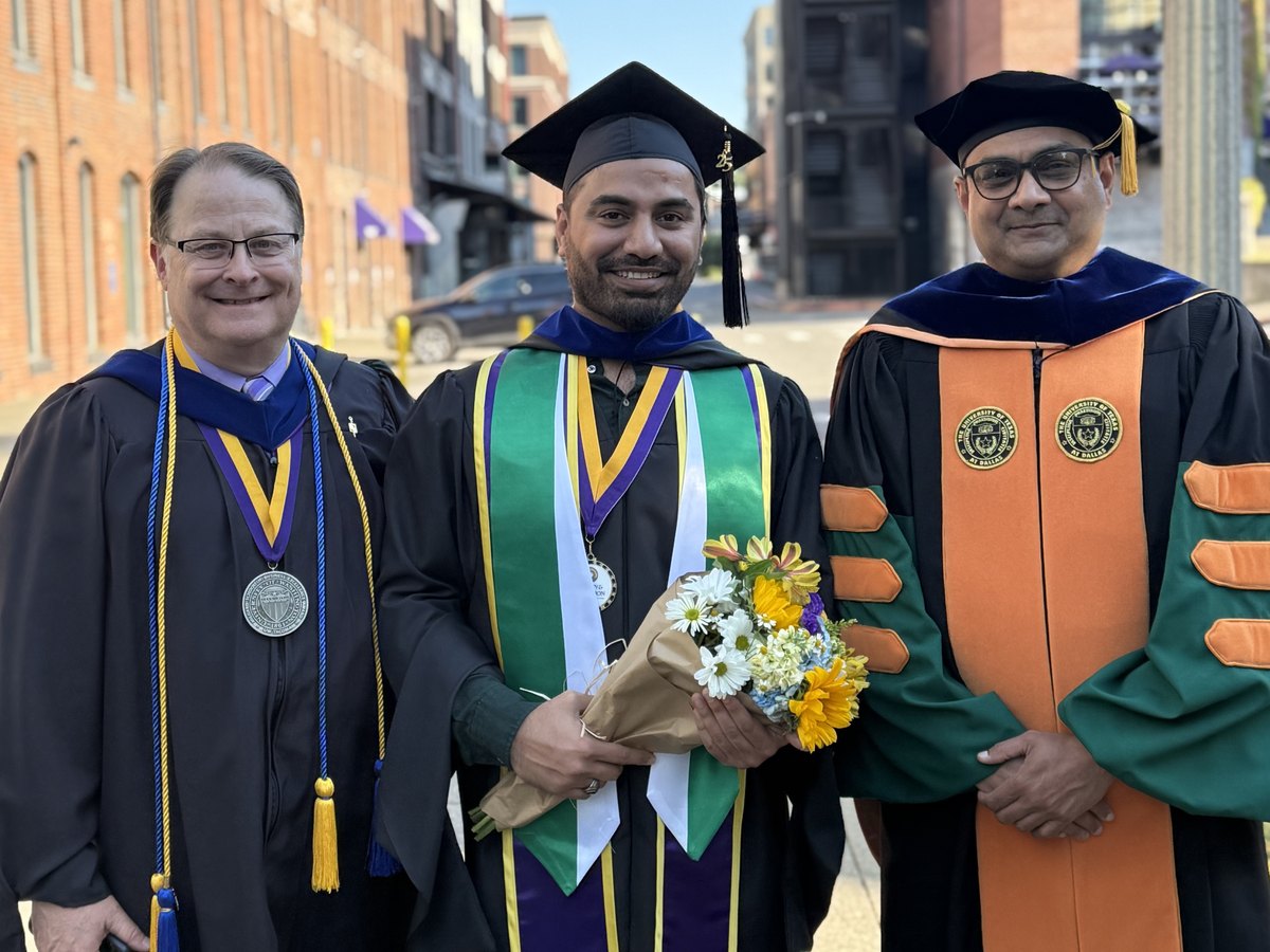 Jakey Raj Rajpal at the UW Tacoma hooding ceremony with faculty