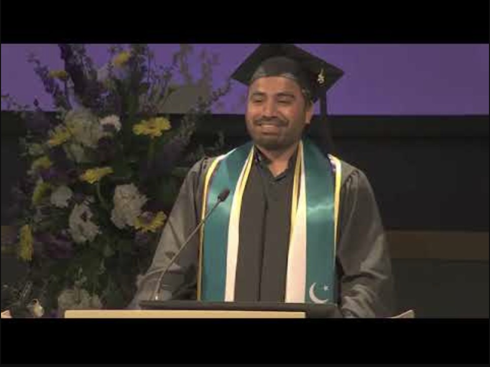 Jakey Raj Rajpal delivering the commencement speech at UWT Hooding Ceremony